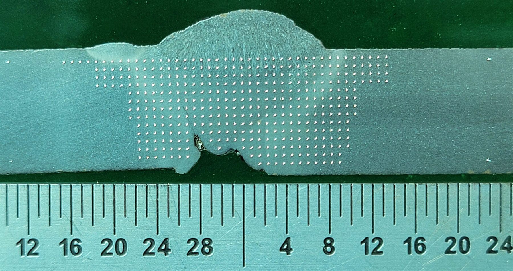 Microhardness survey traverse across a weld and heat-affected zone